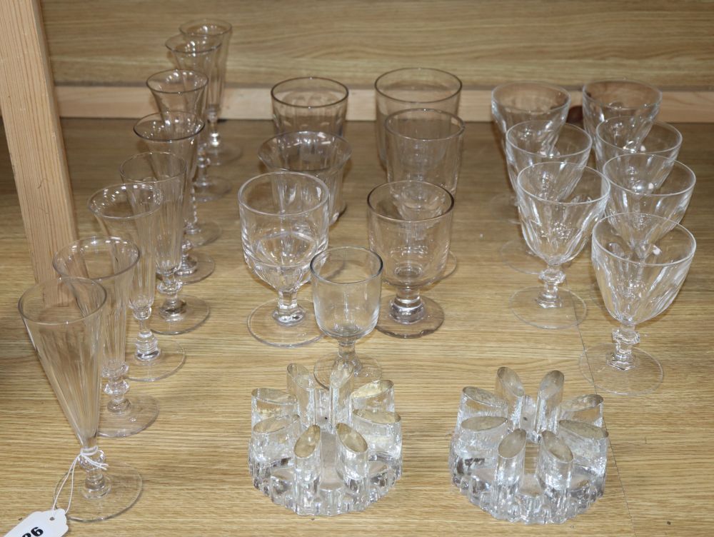 A quantity of glass rummers, flutes, etc.